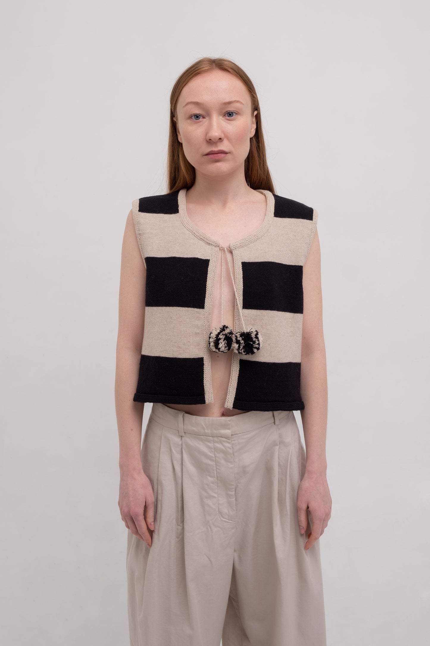 Striped black Vest with pompons