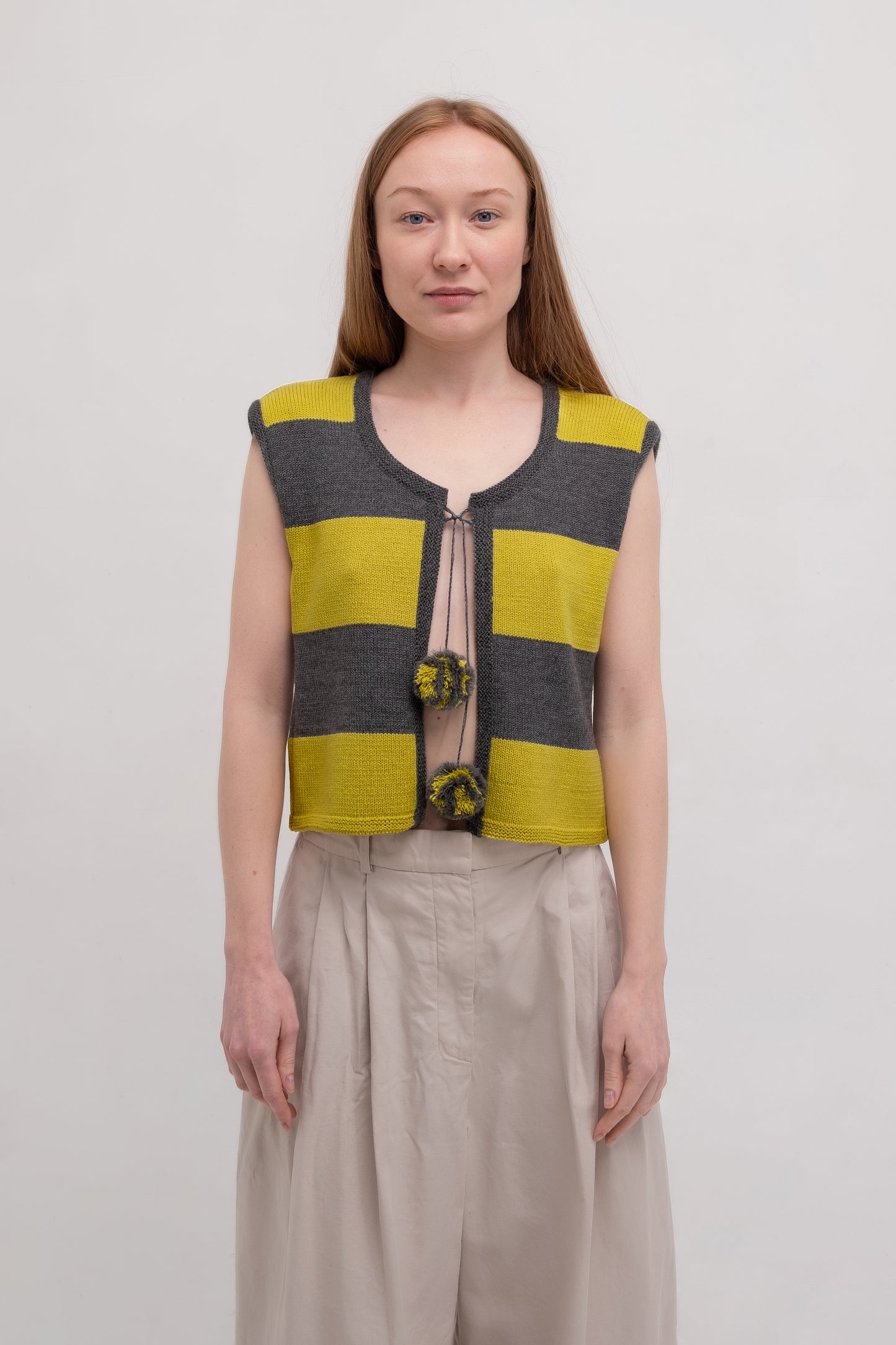 Striped yellow Vest with pompons